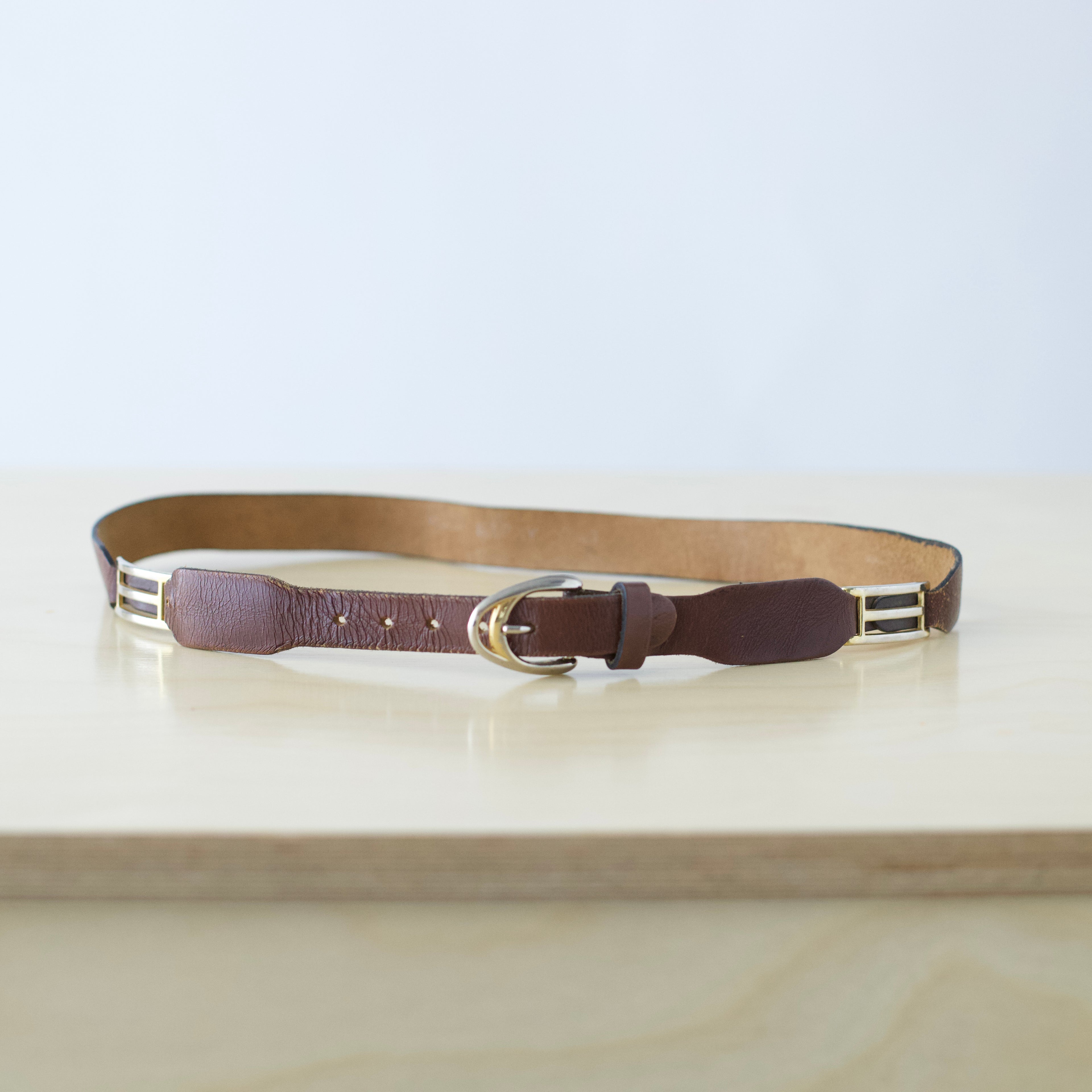 XS/S brown genuine leather belt with brass detailing