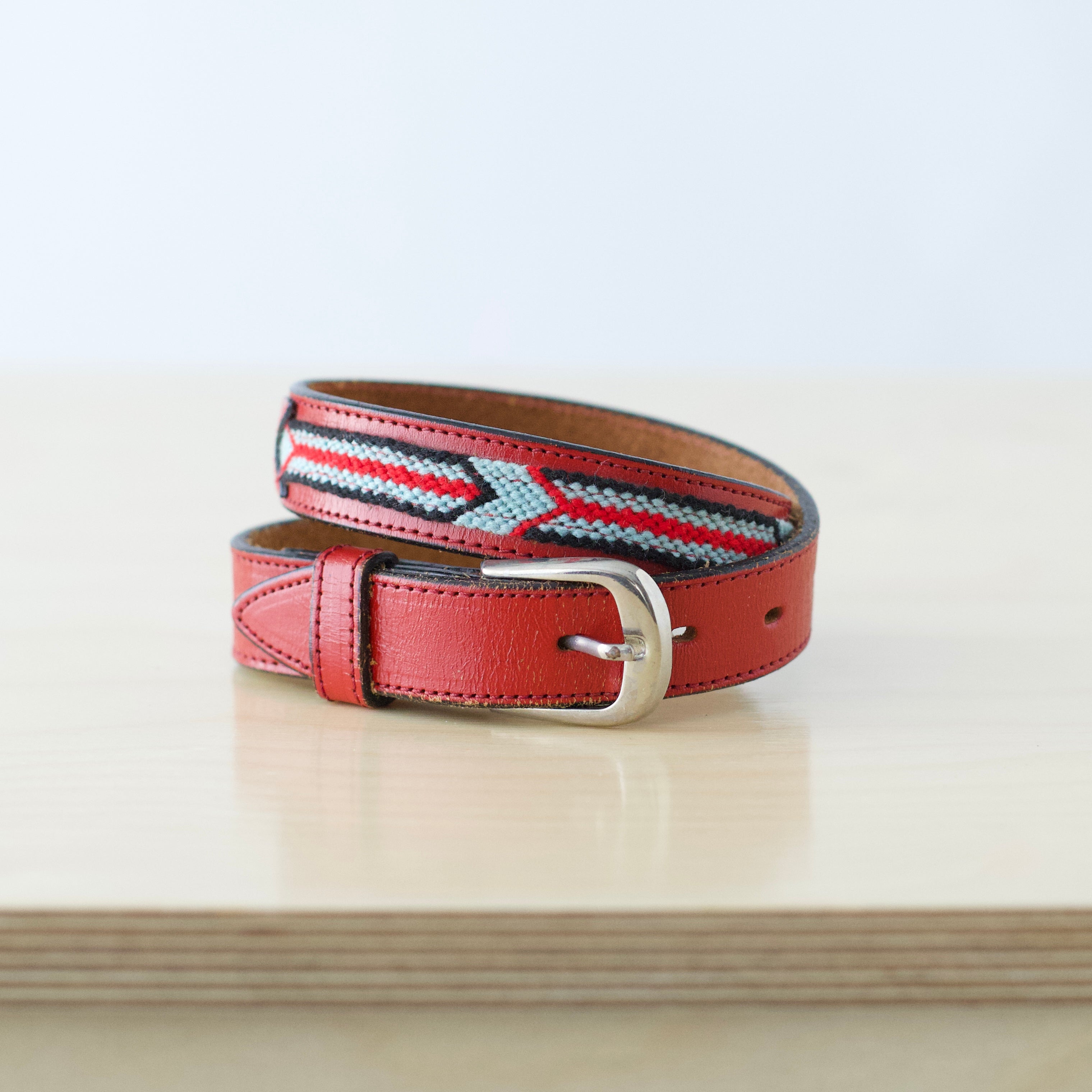 Kids XS/S red leather western belt with woven detail and silver hardware